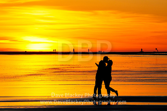 Romantic sunset kiss Chesterman Beach Tofino