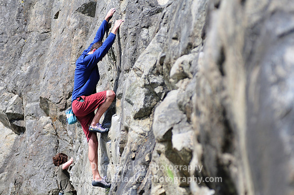 rock climbing, Macaulay Point Park man and woman rock climbing Esquimalt Victoria